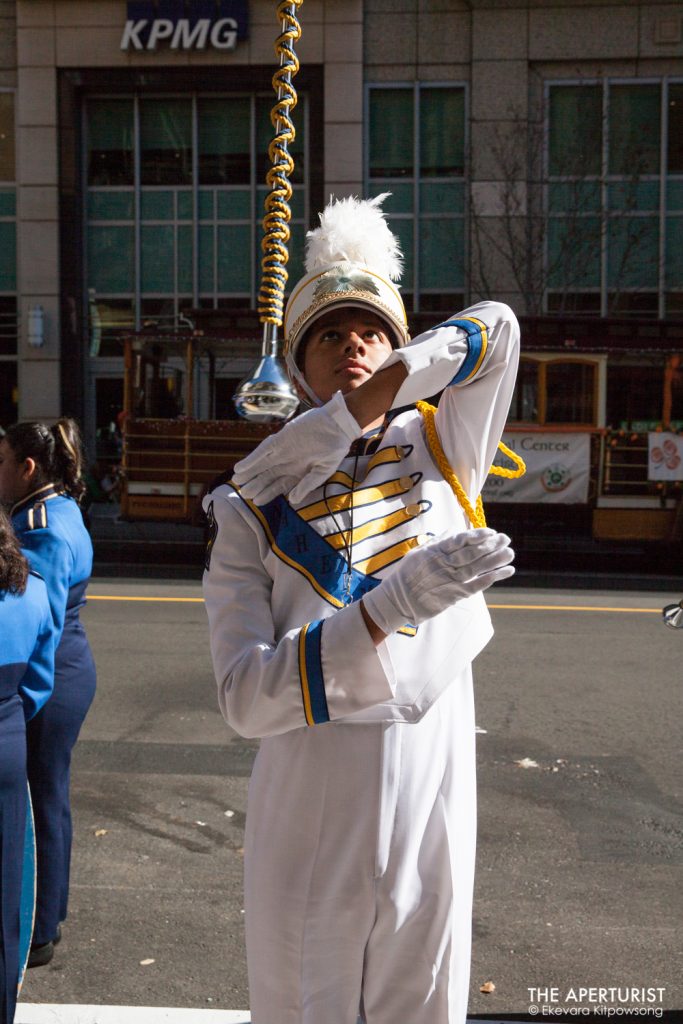 A drum major performs with a baton on 2nd Street await for the start of the 168th annual San Francisco St. Patrick’s Day Parade on Saturday, March 16, 2019, in San Francisco, Calif. (Photo by Ekevara Kitpowsong/Current SF) 