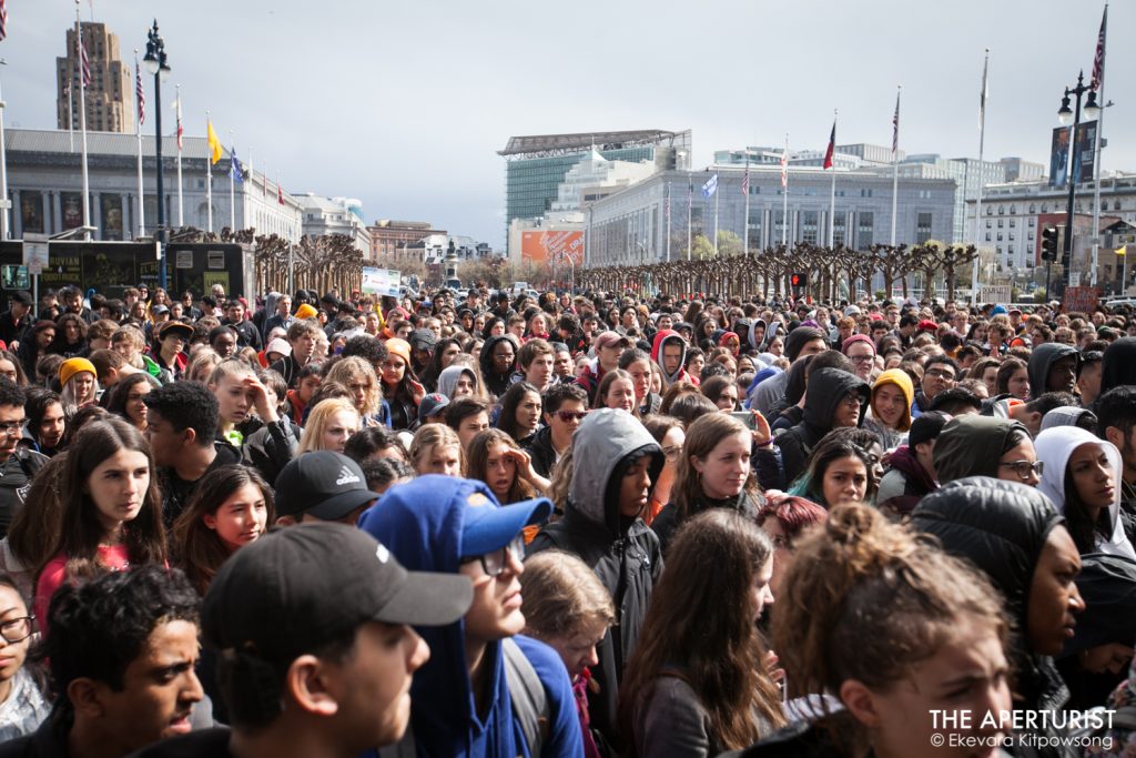 Huge crowd of students gathers in front of San Francisco City Hall on Wednesday, March 14, 2018 as part of a nationwide school walkout to protest against gun violence on the one-month anniversary of the Parkland school shooting in Florida that a gunman killed 17 people. (Photo by Ekevara Kitpowsong)