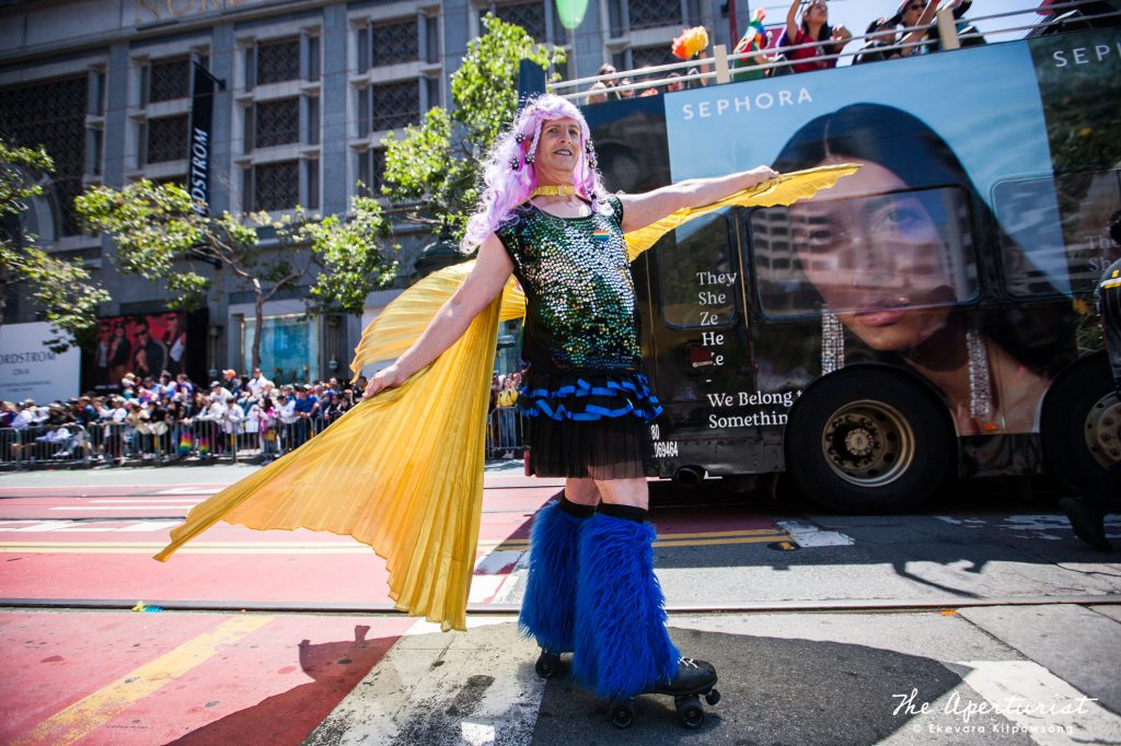 A parade participant in a colorful costume, roller skates in the San Francisco Pride Parade on Market Street in San Francisco on Sunday, June 30, 2019. (Photo by Ekevara Kitpowsong/Current SF)
